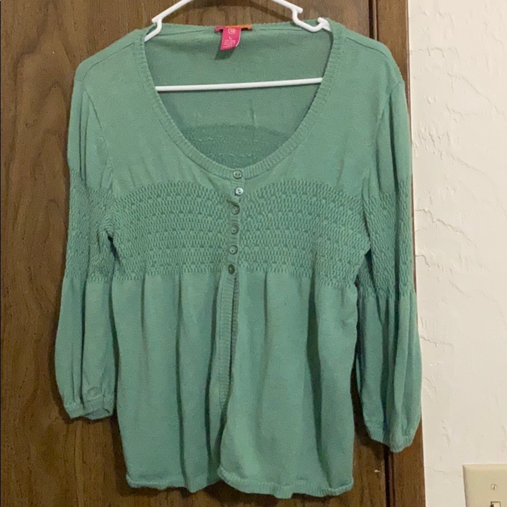 Light green cardigan or sweater